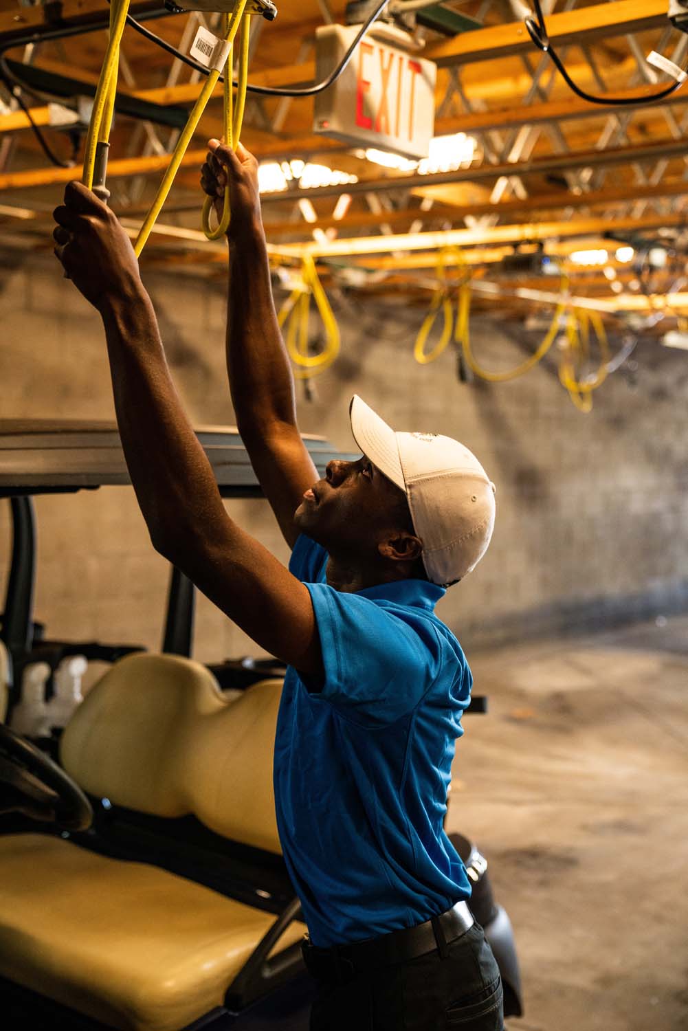 worker setting up electrical equipment