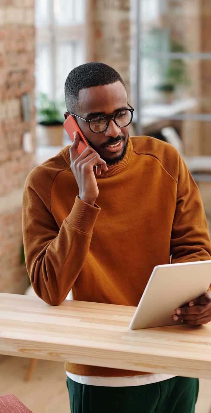 person giving a thumbs up to a zoom call